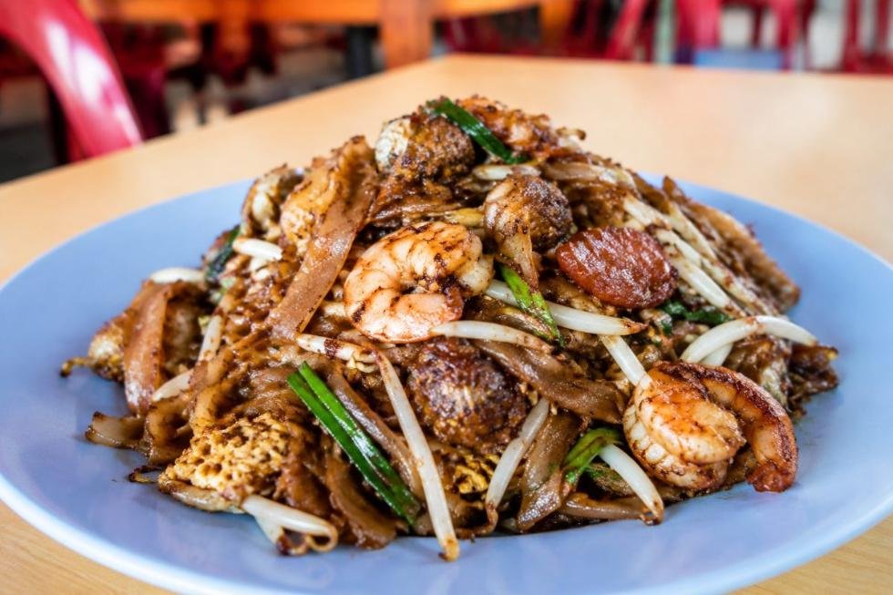 Char Kway Teow, flat noodles wok-charred with prawns, cockles, egg and Chinese sausage, Malaysia street food