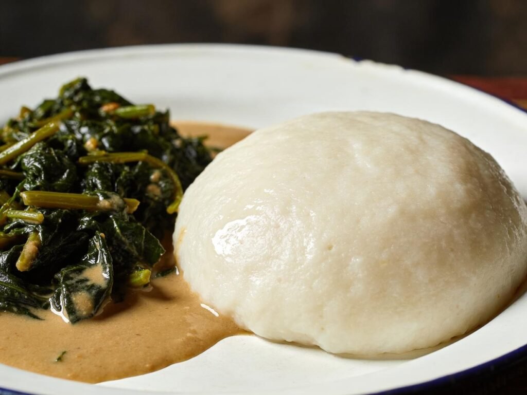 Sadza, stiff white maize porridge at the center of every meal, Zimbabwe main